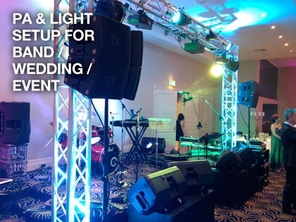 the sound guys setup for band at wedding event, pa and light hire
